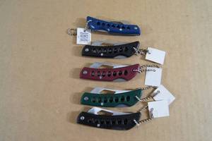 lot 115 image: 5 NEW Skeleton Handle Pocket Knives