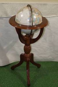 lot 154 image: George Cram Classic Globe in Wood Stand with Pineapple Accent