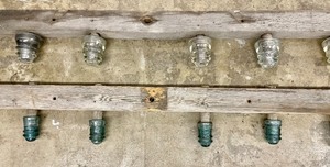 lot 83 image: Vintage Wood with Insulators Attached