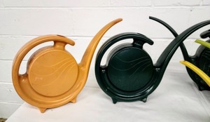 lot 45 image: Vintage Plastic Watering Cans