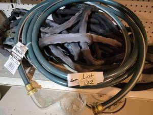 Tote of 3 garden hoses...