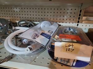 Tote of 8 Shower heads...