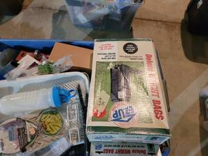 Large blue tote of Misc. Unsold Mer...
