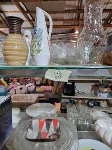 Entire contents of 20 glass shelf d...