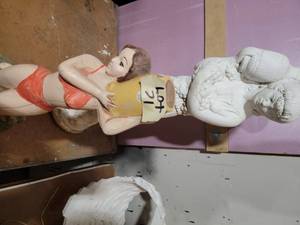 2 Concrete Statues...