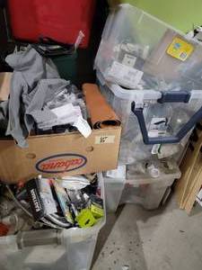 4 totes and 1 box of Misc. Unsold M...