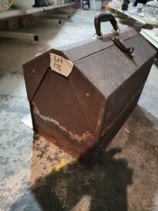 Rusty but trusty metal toolbox with...