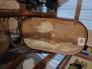 Bent wood rocker with wicker baseb...