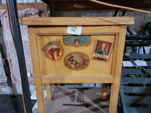 Blonde Cabinet with cigar stickers...