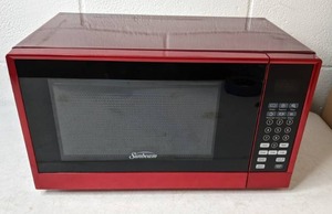 lot 146 image: Sunbeam 0.7 Cu. Ft. 700-Watt Countertop Microwave Oven - Red