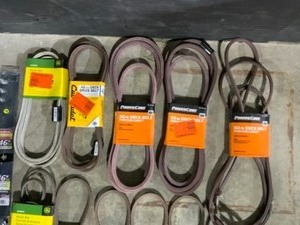 lot 10 image: Assorted Brands & Sizes of Lawn Mower, Tractor & More Deck Belts & Blades. Various Conditions. See Pictures