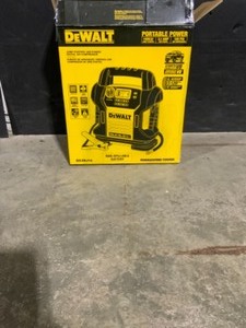 lot 36 image: DEWALT 1400 Peak Amp Portable Car Jump Starter with Digital Compressor. See Pictures