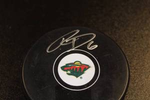 lot 78 image: Minnesota Wild Ryan Donato Autograph Hockey Puck