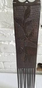 lot 75 image: Carved Tanzania African Wood Pick Comb with Rhinos