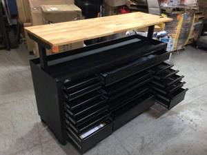 lot 27 image: Heavy-Duty 72 in. W 18-Drawer, Deep Tool Chest Mobile Workbench in Matte Black with Adjustable-Height Hardwood Top by Husky Customer Returns See Pictures