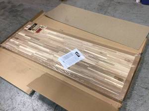 lot 28 image: Unfinished Acacia 6 ft. L x 25 in. D x 1.5 in. T Butcher Block Countertop by HARDWOOD REFLECTIONS Customer Returns See Pictures