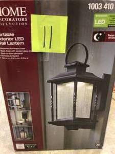 lot 111 image: Home Decorators  Portable Black Outdoor Integrated LED Wall Lantern Sconce