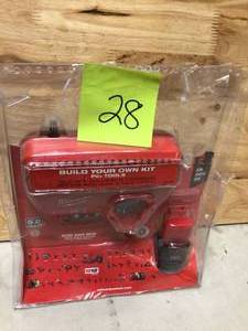 lot 128 image: Milwaukee M12 Charger and Battery open pkg