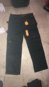 lot 35 image: DEWALT ProTradesman Combo Mens 34 in. W x 31 in. L Black PolyesterCottonElastane Stretch Work Pants