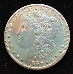 1886-O Morgan Dollar - Rainbow Toning