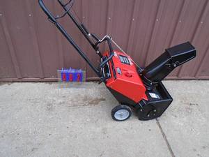 20 2 cycle snow thrower. Good used condition. Tested & works. As shown.
