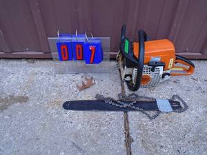 Stihl MS210C chain saw. Runs but uncertain if blade is correct. As shown.