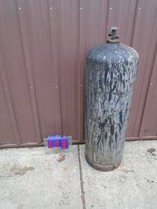 100 LB empty propane tank. As shown.