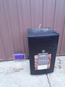 Master Built MES130B smoker. Unassembled. Looks like it was a store display. Needs cord repair. As shown.