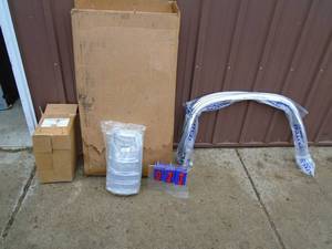Wheel trim & tail light corners for 2000 - 2003 Chevrolet truck. New in box. As shown.