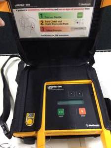 lot 38 image: MSRP $1500 Medtronic Physio Control Lifepak 500 AED Automated External Defibrillator - Test As Working However Needs Replacement Battery
