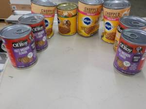 8 Cans Dog Food...
