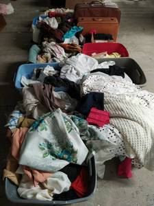 Collection of Linens, Suitcases, and More