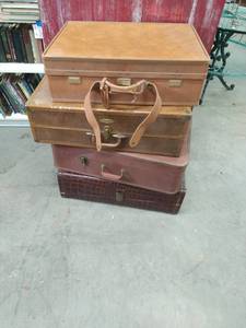 Four Large Pieces Of Luggage