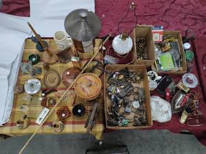 Tabletop Filled with Collectibles and Tools