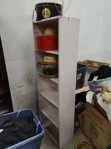 Pink Bookcase with Collection of Hats and Hat Boxes