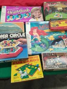 Collection Of Boardgames And Bookshelves