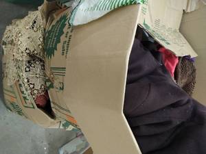 Collection Of Assorted Clothing And Materials