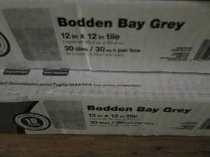 lot 10 image: 3 cases of Bodden Bay 12 in. x 12 i...