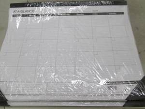 lot 64 image: 15 at a glance desk calenders...