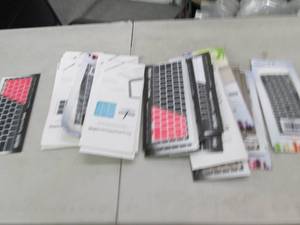 lot 72 image: lot of keyboard covers , cable orga...