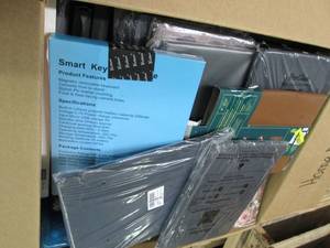 lot 100 image: box of various tablet cases...