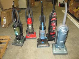 lot 158 image: 5 vacuums all power on...