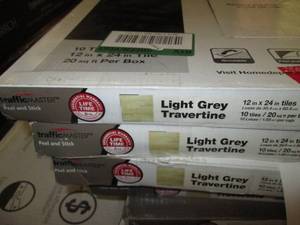lot 136 image: 5 cases of Light Grey 12 in. x 24 i...