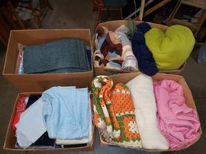 4 Boxes of Various Sizes of Fabric, Quilting and Clothing Supplies