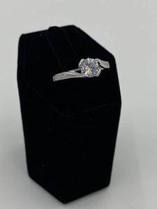 lot 20 image: Silver Ring With bigger Center Rhinestones with Small Rhinestones on Both Sides