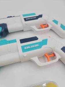lot 63 image: 2 NURF BALL GUNS WITH BALLS
