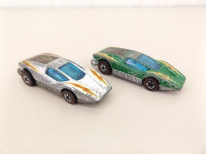 lot 14 image: 2 Original Hot Wheels Redline Large Charge Color Variations