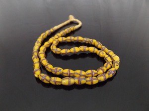 lot 122 image: Genuine African Trade Bead, 52 Venetian Yellow French Cross Bead Necklace
