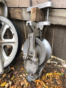 lot 102 image: 2 Large Vintage Industrial Solid Aluminum Pulleys