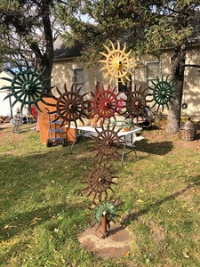 lot 110 image: Awesome Large Antique CultivatorTiller Blade Wheel Tree Sculpture